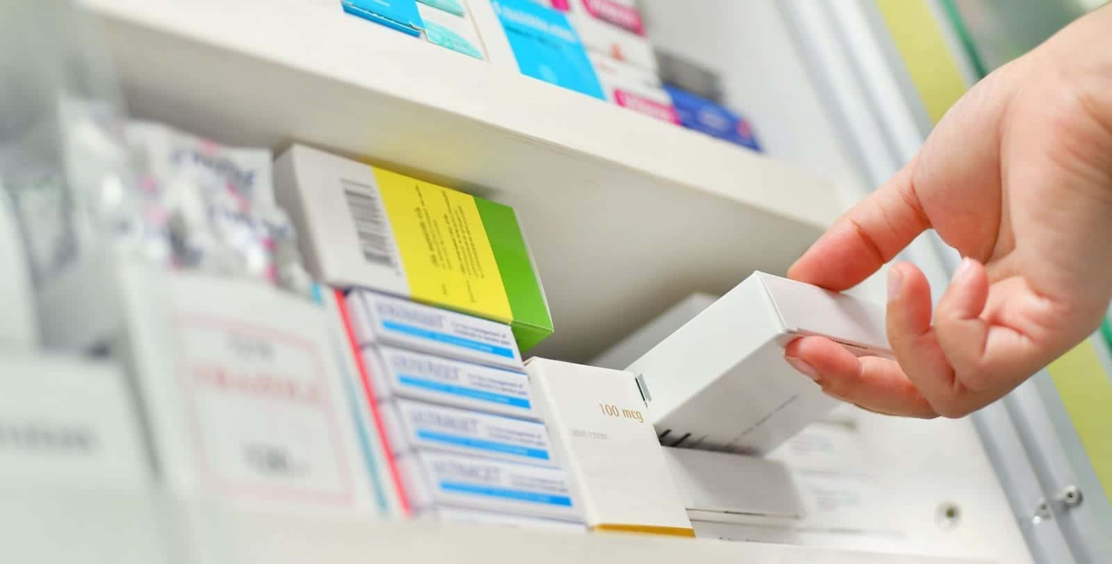 Prescription Drugs On Shelf Inside Pharmacy Stock Photo